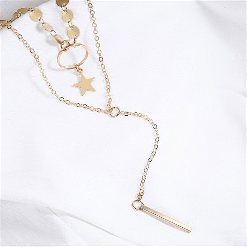 Collar de estrellas con circulo colgante